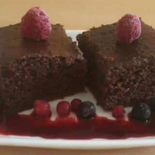 Chocolate yogurt cake served with berries