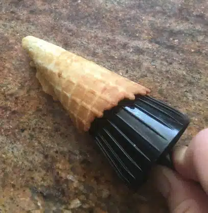 rolling up a waffle cone