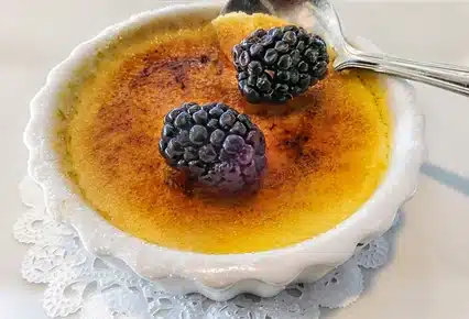 Crema Catalana with blackberries on top