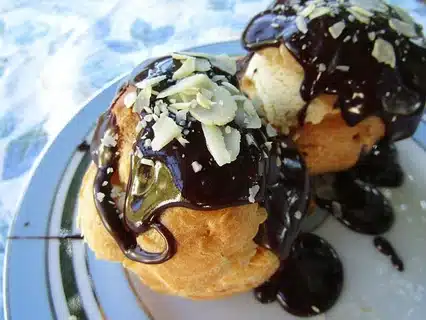 Profiteroles coated with chocolate